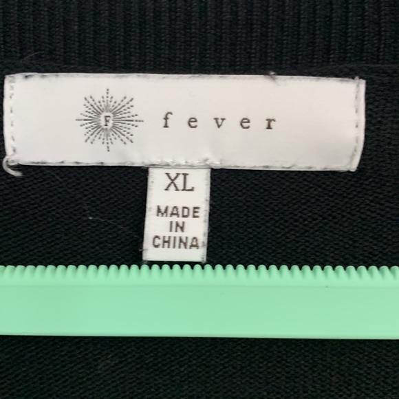 Black V neck Fever sweater with flaired sleeves and around hips. - Picture 2 of 8